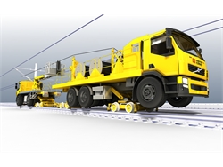 Road rail drum carrier vehicle